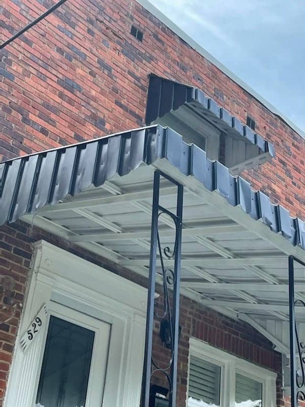 Metal Awning repair project by a Washington DC contractor.